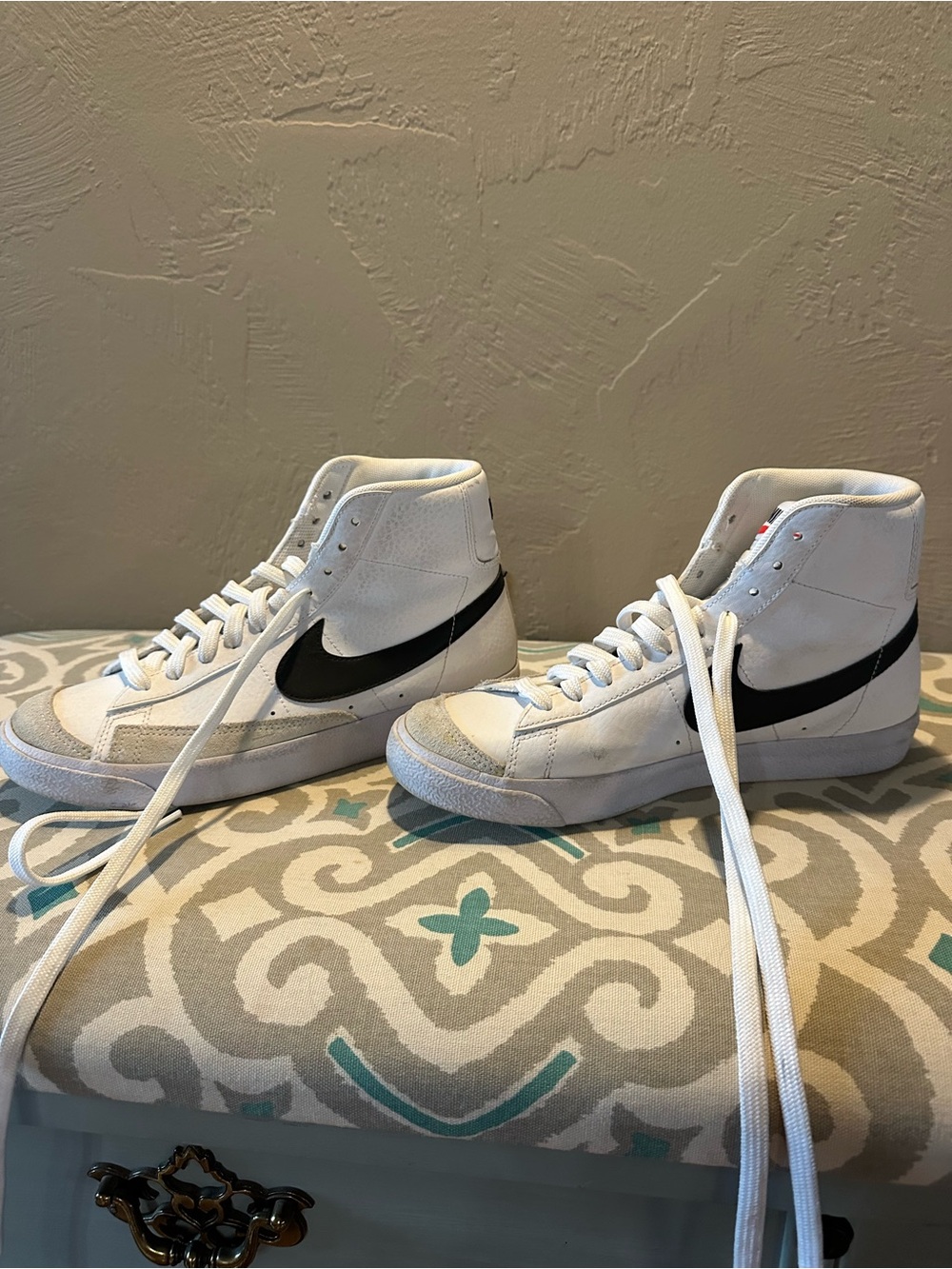Nike White High-Top Sneakers with Black Swoosh